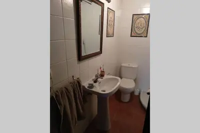 a bathroom with a sink and a toilet at Casa Ribeira Sacra, Ourense, Niñodaguia, Galicia in Ourense