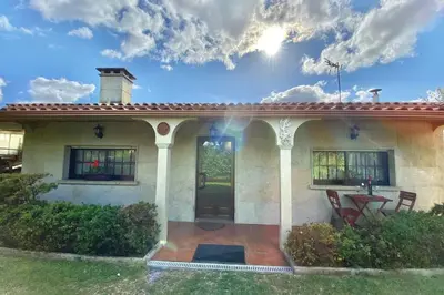 a house with a patio in front of it at A Chabola Mondariz in Pontevedra