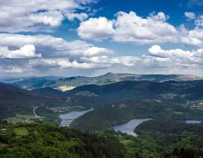 a view of a valley with a river and mountains at Casa 2 Gallos in Ourense