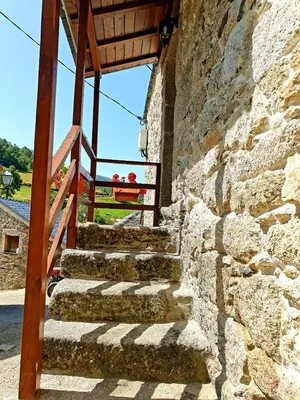 a set of stairs in a stone wall at El Cuarto in Suarbol
