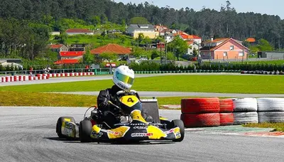 a person riding a racing car on a race track at Eirixo in Valga