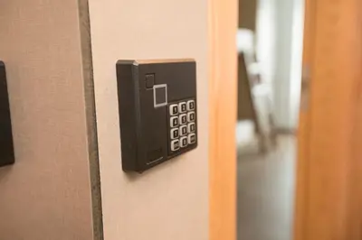 a phone on the door of a room at THOSTEL in Santiago de Compostela
