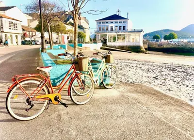 two bikes parked on the side of a street at The Cliffs - Sunset Village Beach 3C in Viveiro