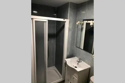 a bathroom with a shower and a sink and a toilet at entrepraciñas 2 in Santiago de Compostela