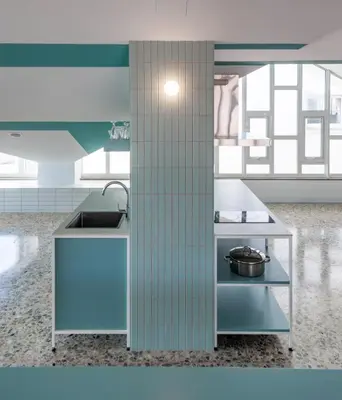 a kitchen with a sink and a counter at Loop INN Hostel Santiago de Compostela in Santiago de Compostela