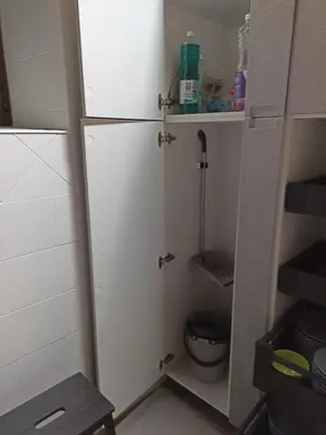 a bathroom with a white closet with a toilet at Finca Eiras in Lugo