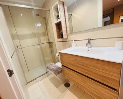 a bathroom with a sink and a shower at Viveiro Centro in Viveiro