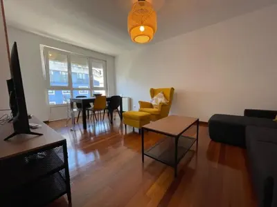 a living room with a couch and a table at Oktheway Calvo Sotelo in Sarria