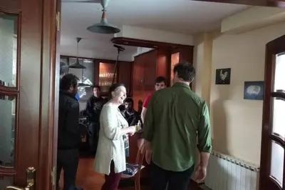 a group of people standing in a room at Casa Morazón Fontán Sada in Sada