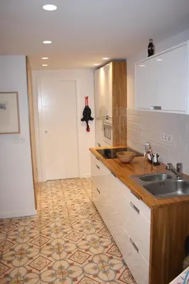 a kitchen with a sink and a counter top at CASA REHABILITADA EN CASCO HISTÓRICO in Santiago de Compostela