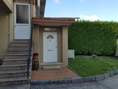 a house with a white door and a porch at CASA DE MELCHOR in Cruces