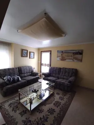 a living room with two couches and a coffee table at CASA DE MELCHOR in Cruces