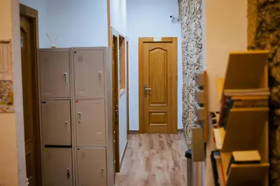 an empty room with a door and a hallway at Hostal Santa Cruz in Santiago de Compostela