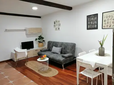 a living room with a couch and a table at SE@SE a 100m.Catedral. in Santiago de Compostela
