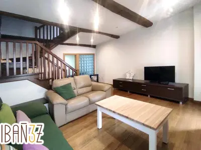 a living room with a couch and a table at Ibañez 3 in Ribadeo