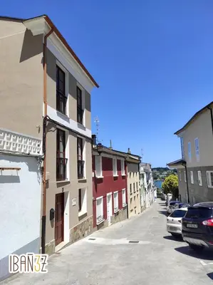 a street with buildings on the side of a road at Ibañez 3 in Ribadeo