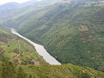 an aerial view of a river in a valley at Casa do Hiebra Alojamiento Rural Ribeira Sacra in Castroncelos