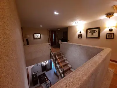 an overhead view of a staircase in a house at Casa rural en entorno privilegiado in Valongo