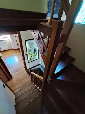 an overhead view of a wooden staircase in a house at Mirador del Navia in Serandinas