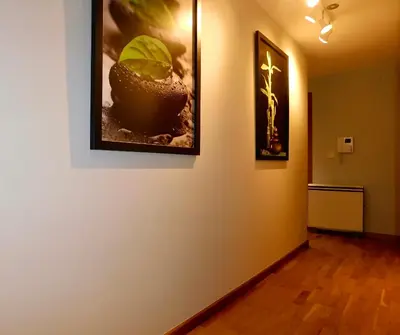 a hallway with two pictures on the wall at Rías Altas Home Sada in Sada