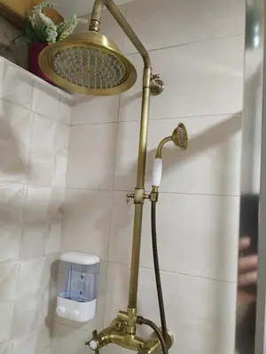 a shower in a bathroom with a shower head at Rincón del Viso in Ourense