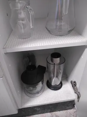 a shelf with a blender and other items on it at Casa Costal in Mondariz