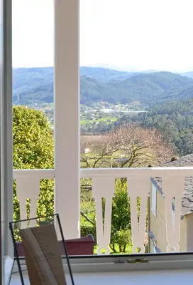 a view from the window of a house at Apartamentos Minas de Silvarosa in Viveiro