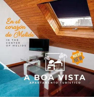 a room with a television and a glass table at A boa vista in Melide