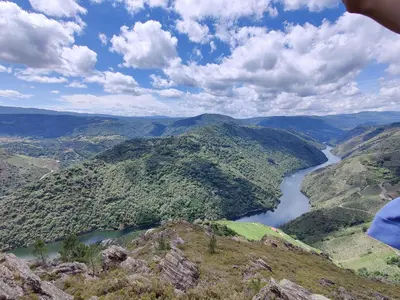 a view of a river from the top of a mountain at La Casita de la Ribeira Sacra in Monforte de Lemos
