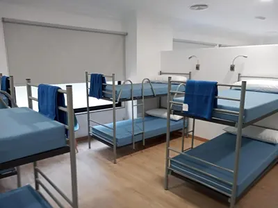 a group of bunk beds in a room at A Fonte De Compostela in Santiago de Compostela