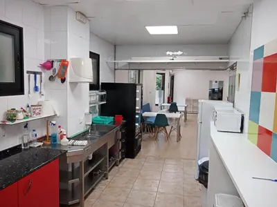 a kitchen with a counter top and a kitchen with at A Fonte De Compostela in Santiago de Compostela