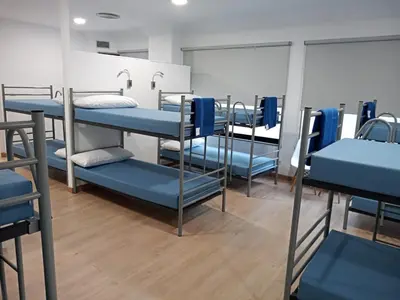 a group of bunk beds in a room at A Fonte De Compostela in Santiago de Compostela