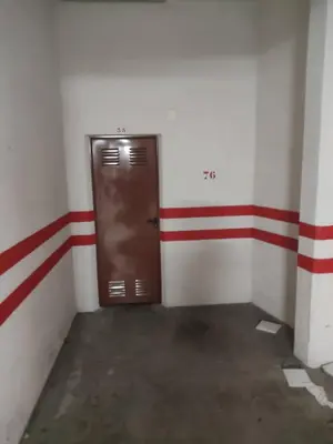 a door in a room with red and white stripes at Apartamento en Viveiro (Casco histórico) in Viveiro