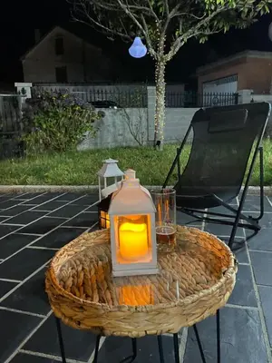 a lantern sitting on top of a table at ACASADACONCHA in Moeche