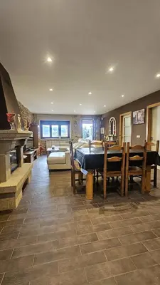 a large living room with a pool table in it at Casa de piedra, A Lameira in A Coruña