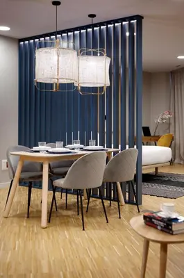 a dining room with a table and chairs at I Loft Santiago by Upper Luxury Housing in Santiago de Compostela
