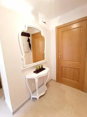 a bathroom with a white sink and a mirror at Indiano 2K in Viveiro