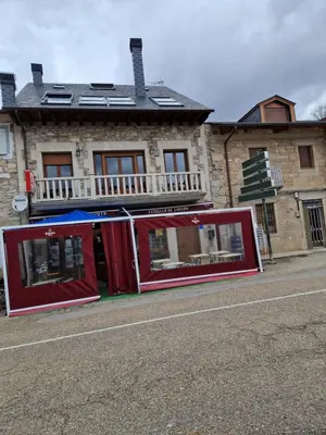 a building on the side of a street at Casa Mariana in Lubián