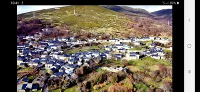 an aerial view of a village on a hill at Casa Mariana in Lubián