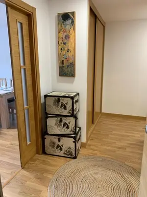 a stack of three boxes in a room at Apartamento Porta da Vila in Viveiro