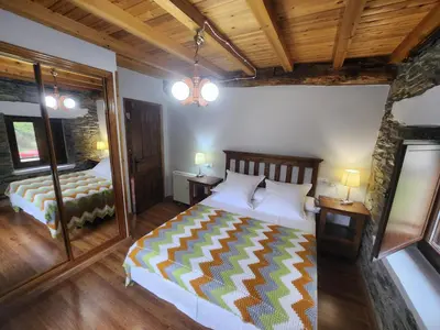 a kitchen with a sink and a counter top at Valles del Narcea, Apartamentos Rurales in Cangas del Narcea