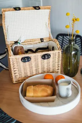 a plate of bread and a cup of coffee on a table at Cabañas Huma 2 in Vegadeo