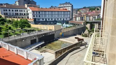 a view of the amphitheater in the city at Apartamentos Turísticos As Burgas 6 by Bossh! Hotels in Ourense