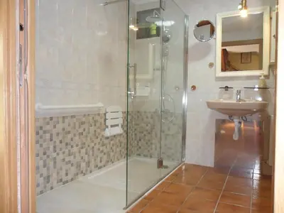 a bathroom with a shower and a sink at Casa Da Vieira in Ourense