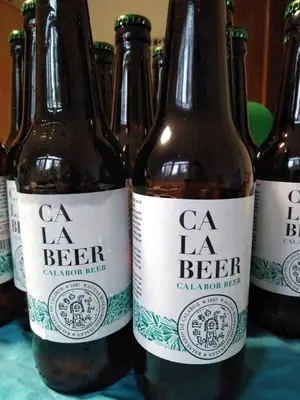 a group of bottles of beer on a table at Balneario de Calabor in Calabor