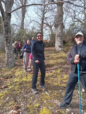 a group of people standing in the woods at Balneario de Calabor in Calabor