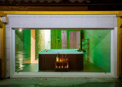 a display window of a bathroom with a tub at Casa Peña Dura in Lalín