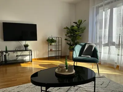 a living room with a tv and a coffee table at Oktheway Pedro Saco Street 2 in Sarria