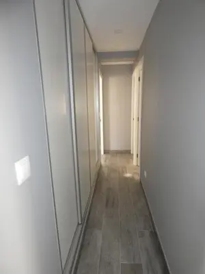 a hallway with mirrors and a tile floor at O Abeiro do Eume in Puentedeume