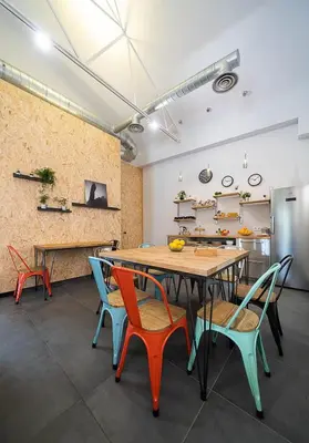 a dining room with a table and chairs at Dpaso hostel in Chantada